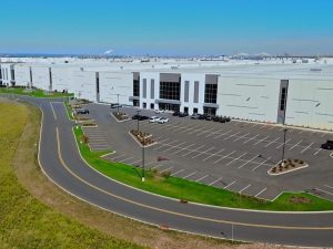 Screenshot with an aerial view of GOFO's new facility, a distribution and sorting hub in New Jersey
