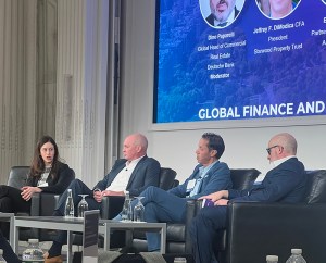 Photo of panelists at global equity panel at NYU conference