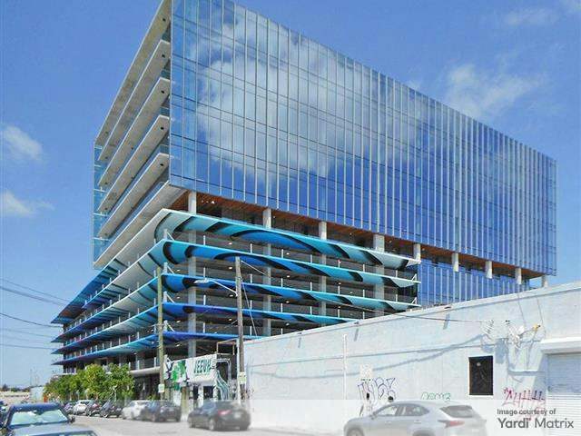 Exterior shot of 545 Wyn, a 324,935-square-foot office building in Miami.
