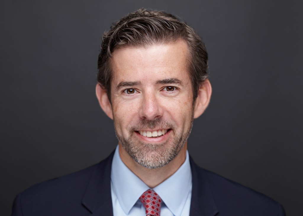 a headshot of Brian Barry, senior vice president at LCOR