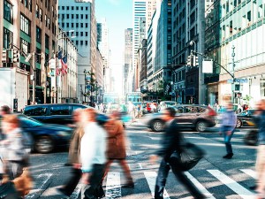 Crowded street with people in New York in springtime