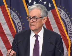 Jerome Powell speaks at a press conference.