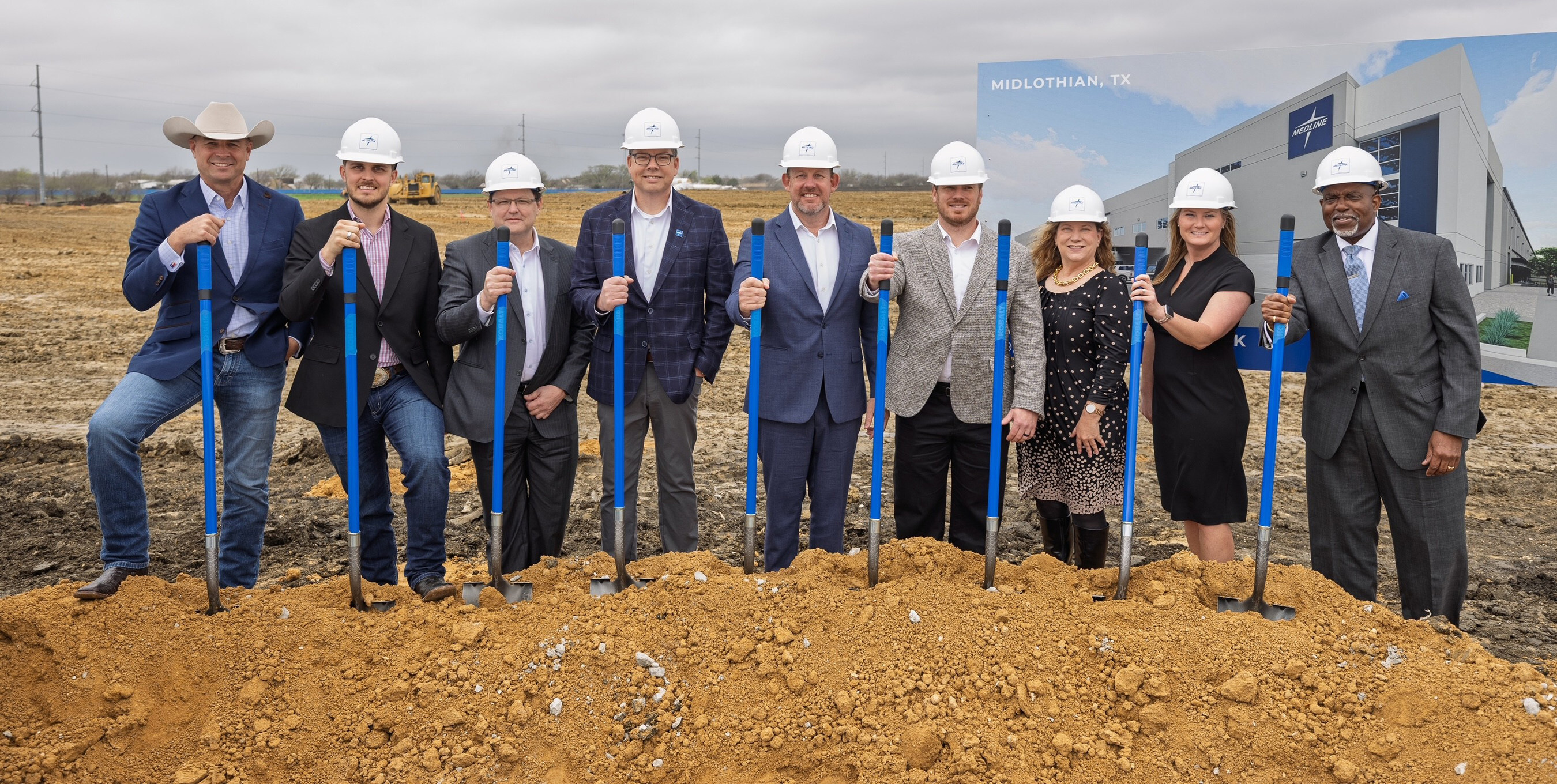 Exterior shot depicting the officials attending Medline's groundbreaking event. They are as follows, from left: U.S. Rep. Jake Ellzey; Midlothian City Council member and Mayor Pro Tem Clark Wickliffe; Joe Arruda, system senior vice president, supply chain services, Baylor Scott & White Health; Sean Halligan, executive vice president of supply chain, Medline; Ed Graves, vice president of regional field sales, Medline; Brandon Forcier, vice president of regional operations, Medline; Janie Havel of the Texas Economic Development & Tourism Office; Victoria Roberts, president and CEO of the Midlothian Chamber of Commerce, and Chaplain Walter White Jr. of Parkland Health.