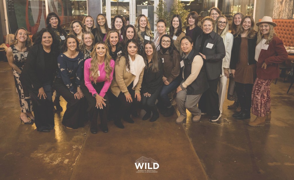 group photo of women attending a conference