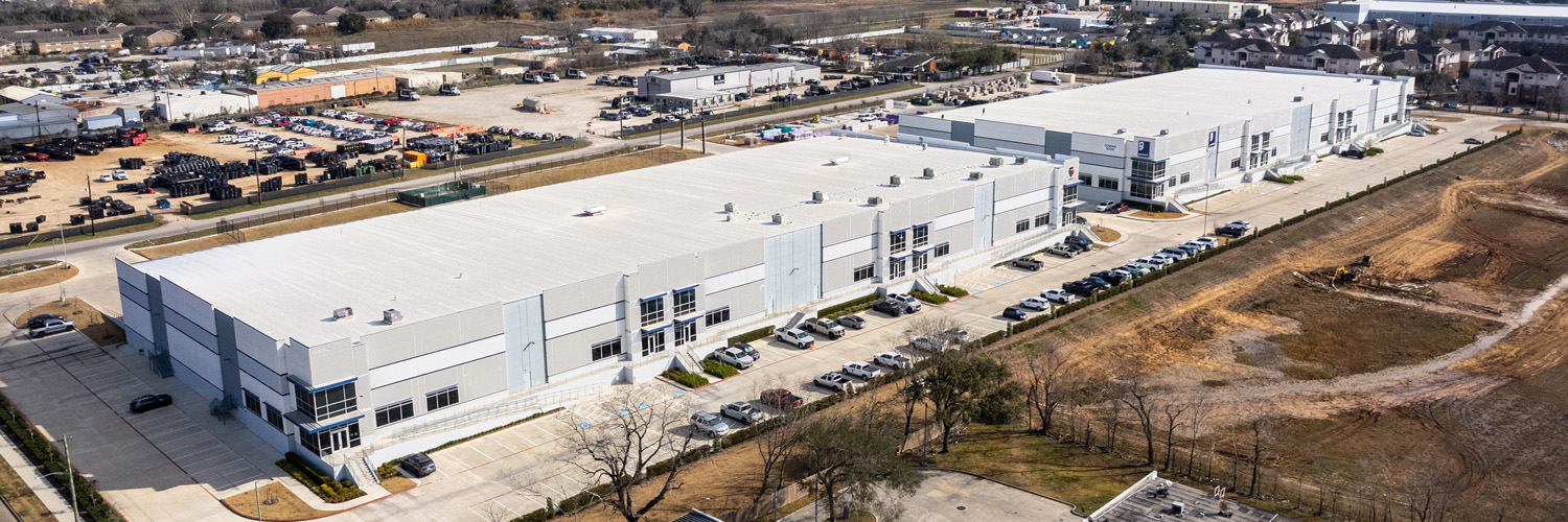 Drone shot depicting the two warehouses that CenterPoint acquired in Houston.
