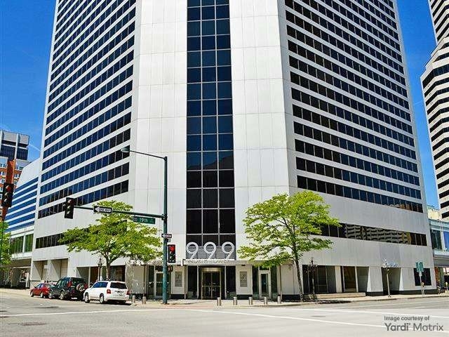 Exterior shot of Denver Place, an office building in downtown Denver.