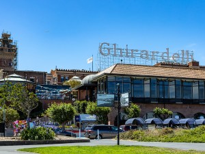 Outside shot of the old Ghirardelli chocolate factory in the Ghirardelli Square, a historical mixed-use asset in San Francisco.