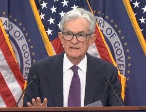 Jerome Powell speaks at a press conference.