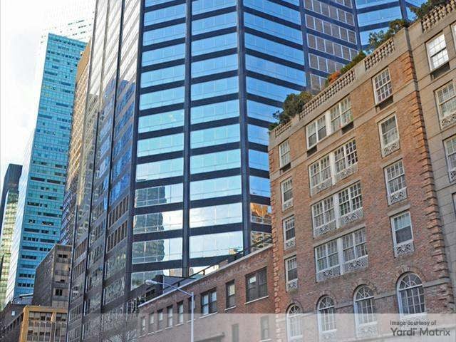 Exterior shot of the office building at 875 Third Ave., a 700,000-square-foot property in Midtown East.