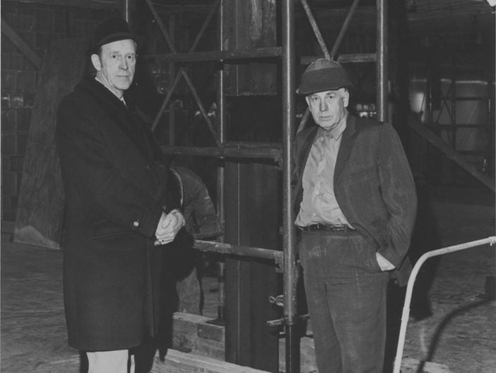 an old photo showing Gordon Peterson (left) and George Adolfson (right)