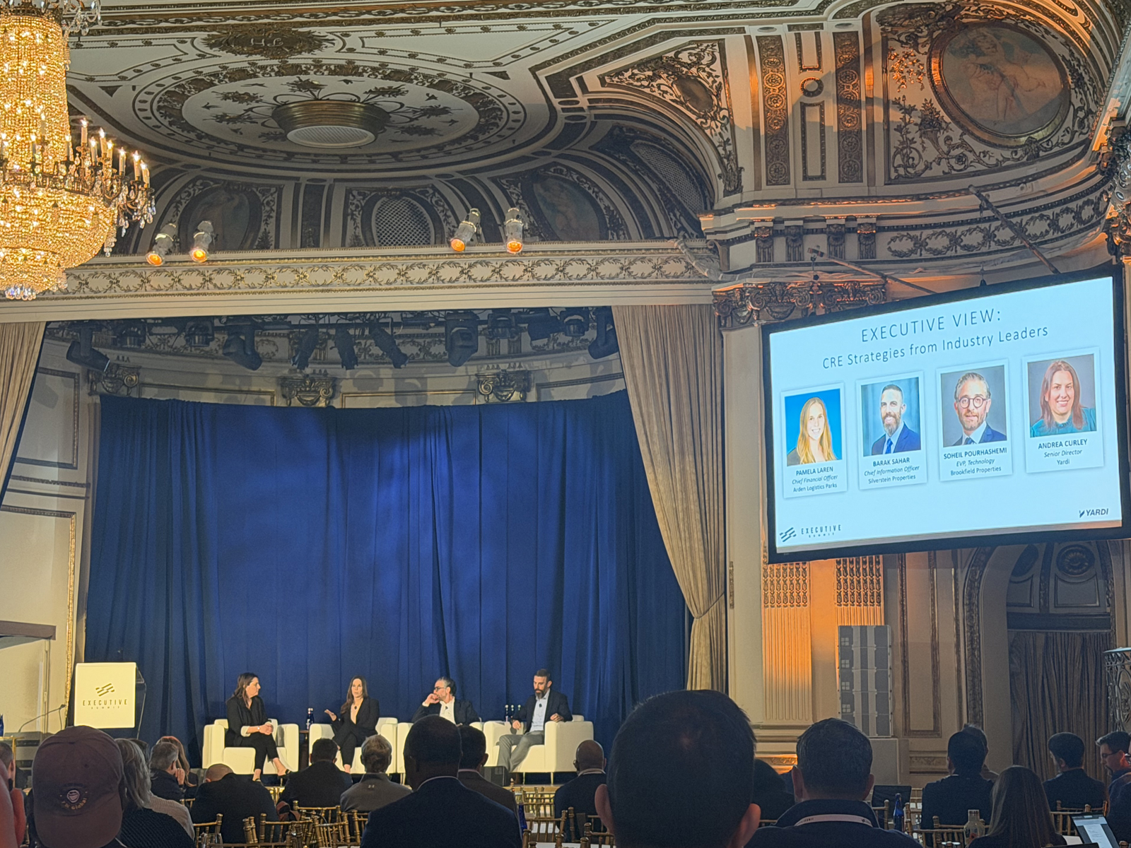 Image of a panel discussion at a conference