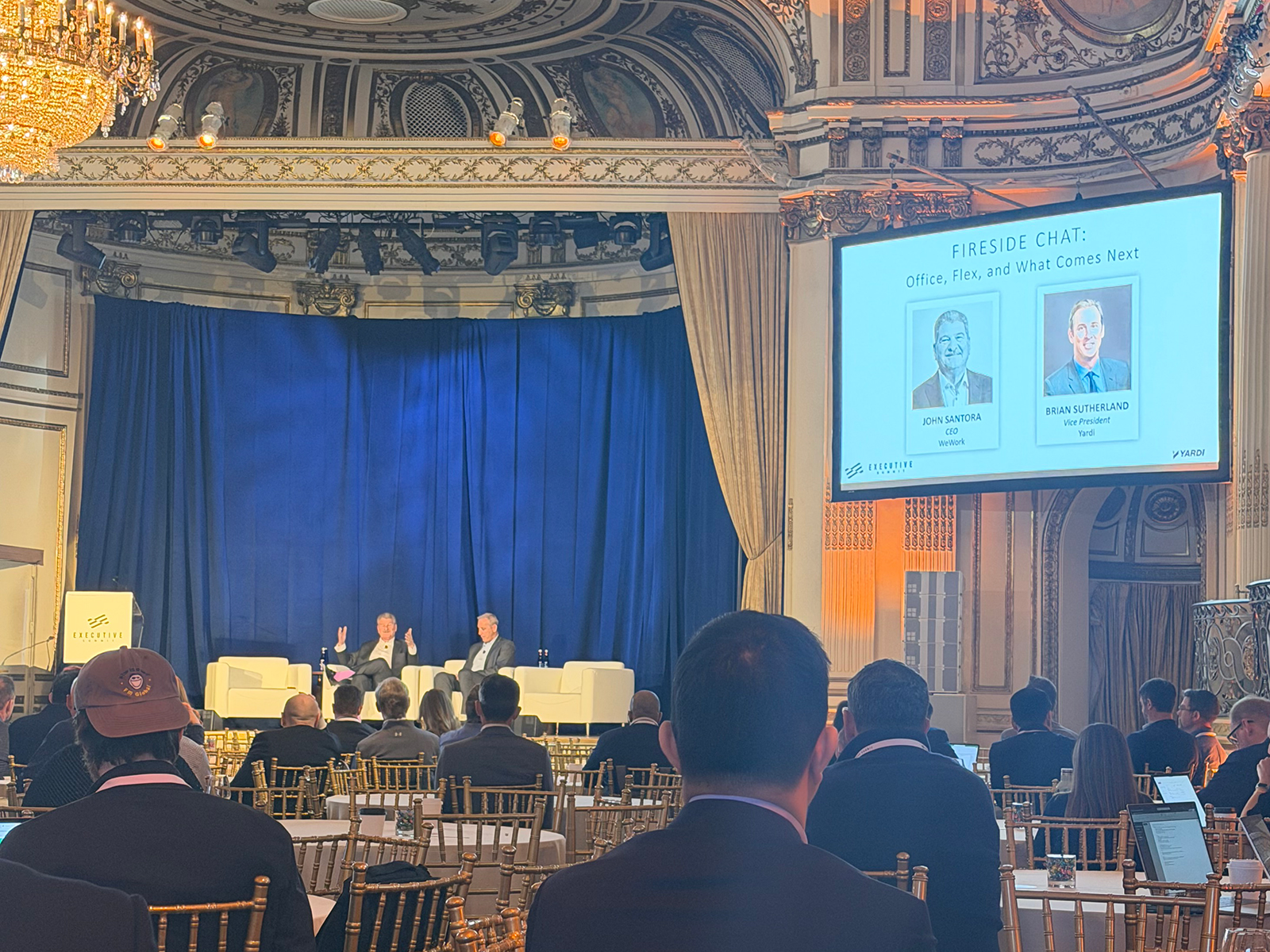 Image of a fireside chat with the WeWork CEO at the Executive Summit