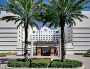 A photo of the front entrance to the Sheraton Suites hotel in Plantation, Florida.