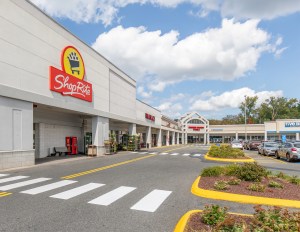 A photo of the Tri-City Plaza shopping center.
