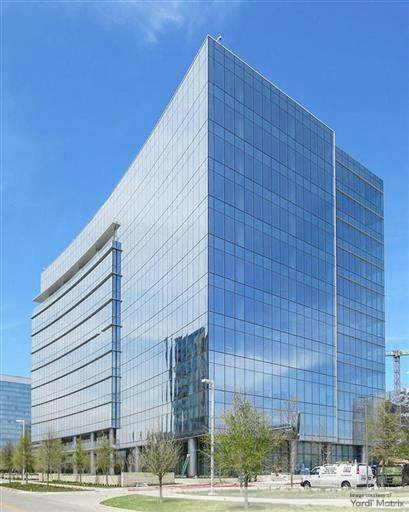 Exterior shot depicting The Star at 17 Cowboys Way, an office property in Frisco, Texas, acquired by FM Investments.