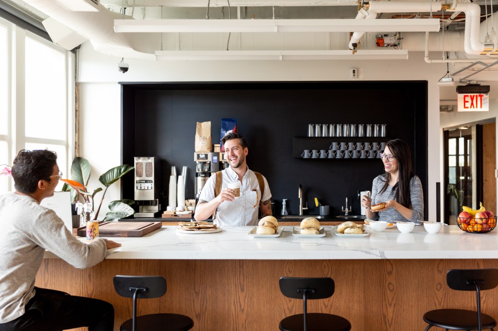 Many aspects of current coworking design reflect the flexibility some more traditional spaces are aiming for. Image courtesy of Industrious via CBRE