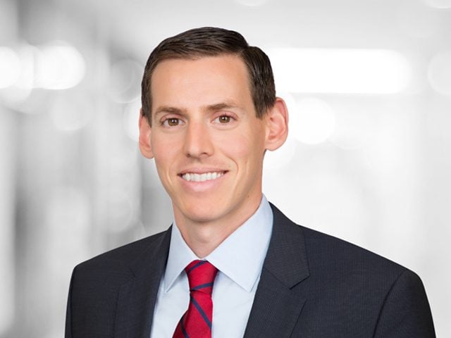 A headshot photo of David Guarino, Head of Global Data Center & Tower Research at Green Street.