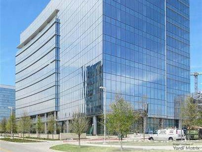 Exterior shot depicting The Star at 17 Cowboys Way, an office property in Frisco, Texas, acquired by FM Investments.