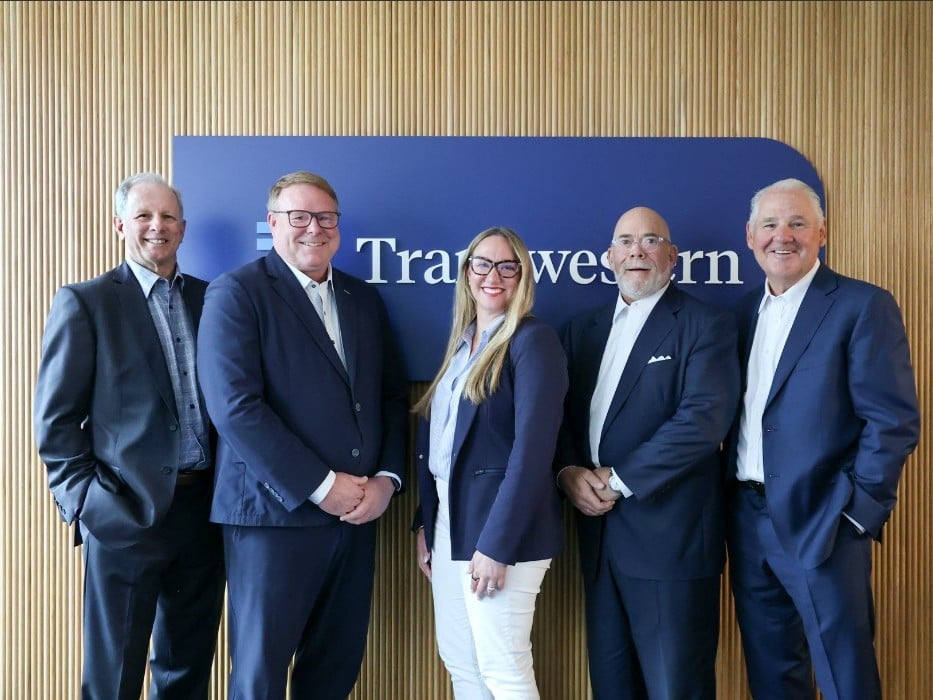 Shot of Transwestern and Forte Real Estate partners handshaking.