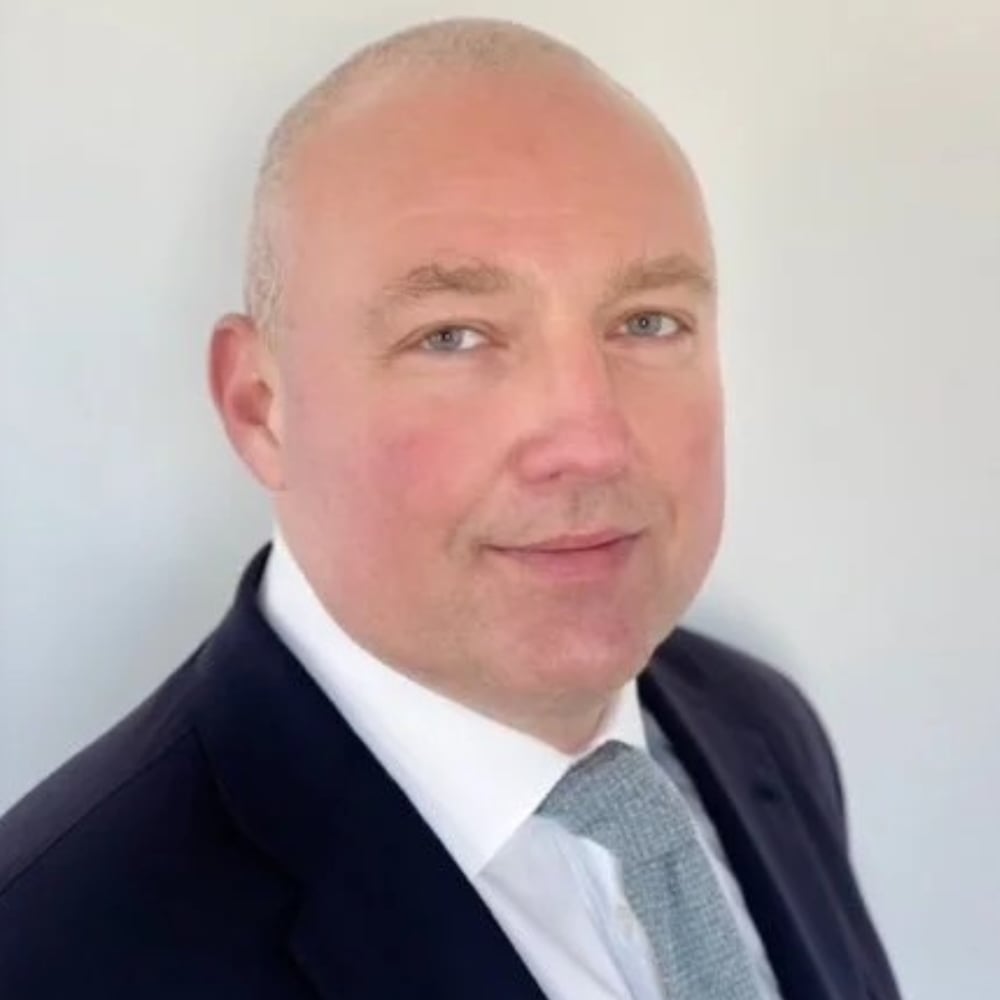 Headshot of Victor Baev, managing director, E1 Capital | Dundon Advisers