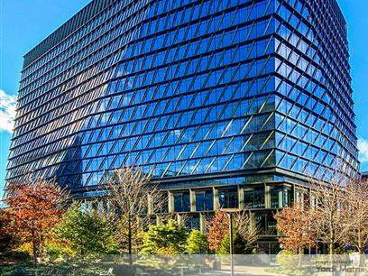 Exterior shot of One Boston Wharf, a 20-story office property in Boston's Seaport District.