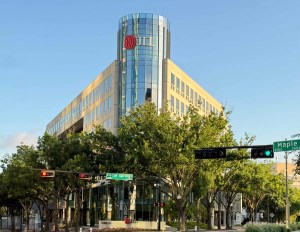 A street-level photo of 2401 Cedar Springs Road, an office building in Uptown Dallas.