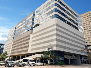 A ground-level photo of Lavaca Plaza in Austin, Texas.