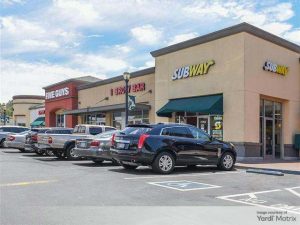 Outdoor shot of Pinole Valley Shopping Center, a 66,000-square-foot retail property in Pinole, Calif.