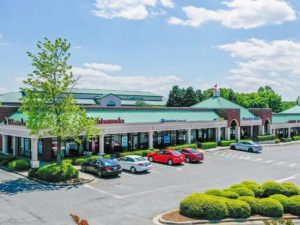 Image of one of the buildings within Windsor Square Shopping Center, a shopping center in Matthews, N.C.